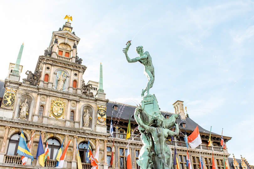 Brabo fountain and city hall of Antwerp Belgium
