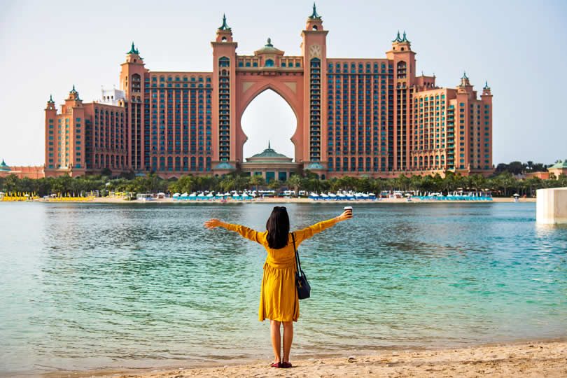 Woman in front of Atlantis The Palm hotel