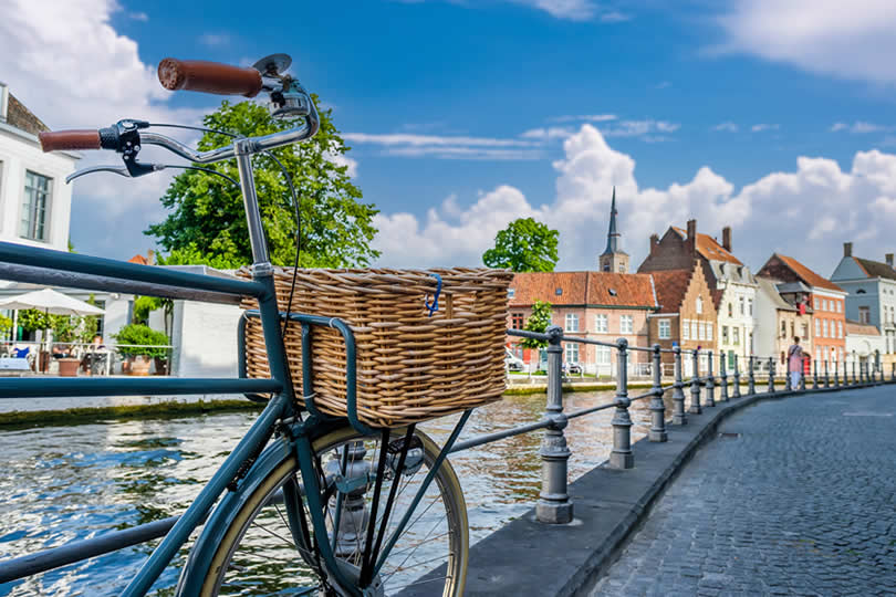 Bicycle on historic street in Brugge