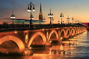 Bordeaux Pont de Pierre bridge in the evening