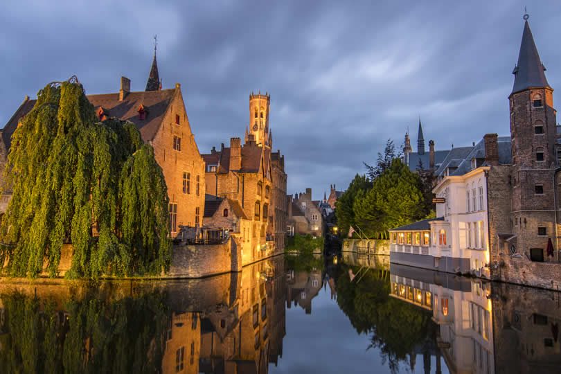 Bruges Belfry and canal by night
