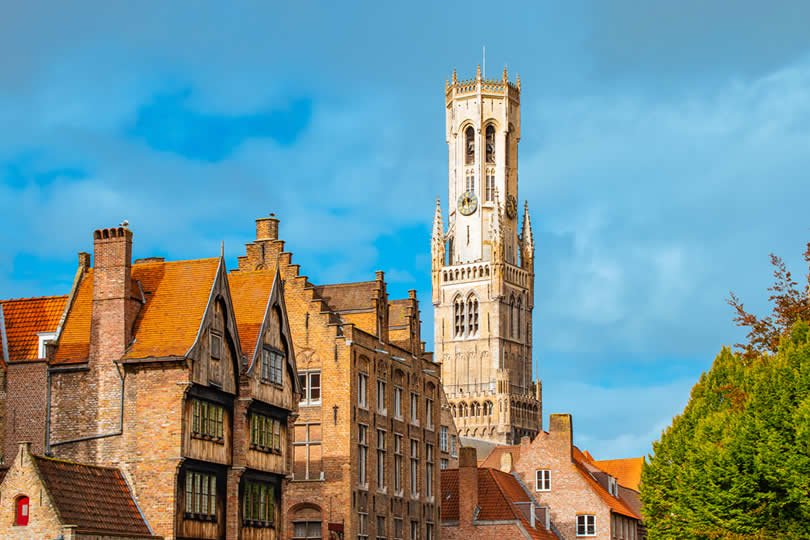Belfry in Bruges and Old Canal Houses and Hotel