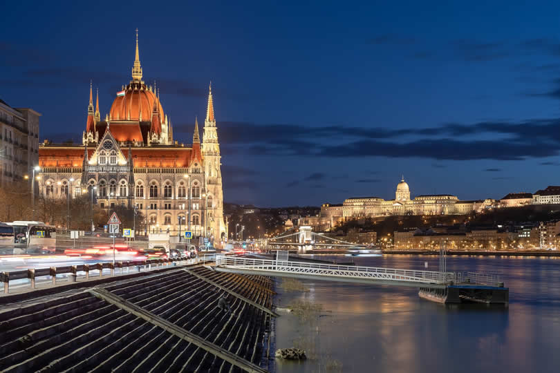 Budapest Parliament and Danube river by night
