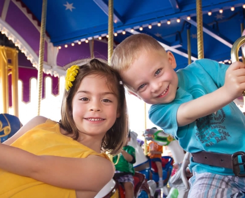 Children on Carousel in Disneyland Paris