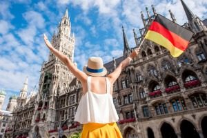Woman with German flag in Altstadt Munich