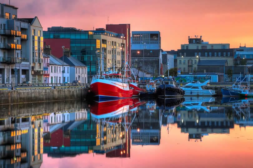Galway docks area with boats in the evening