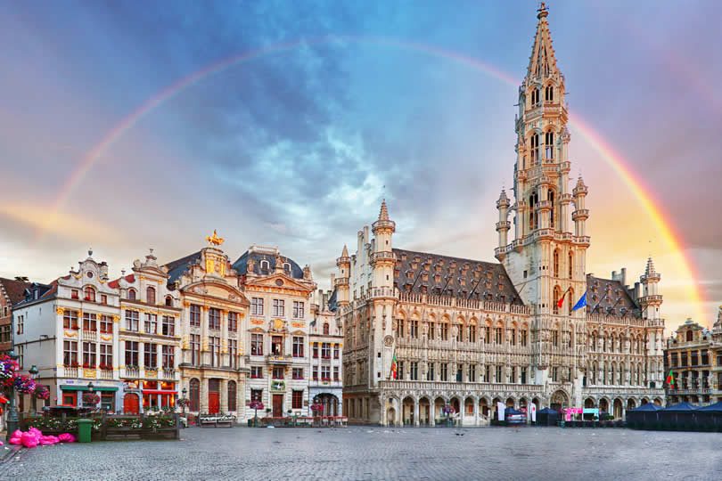 Rainbow over Grand Place square in Brussels